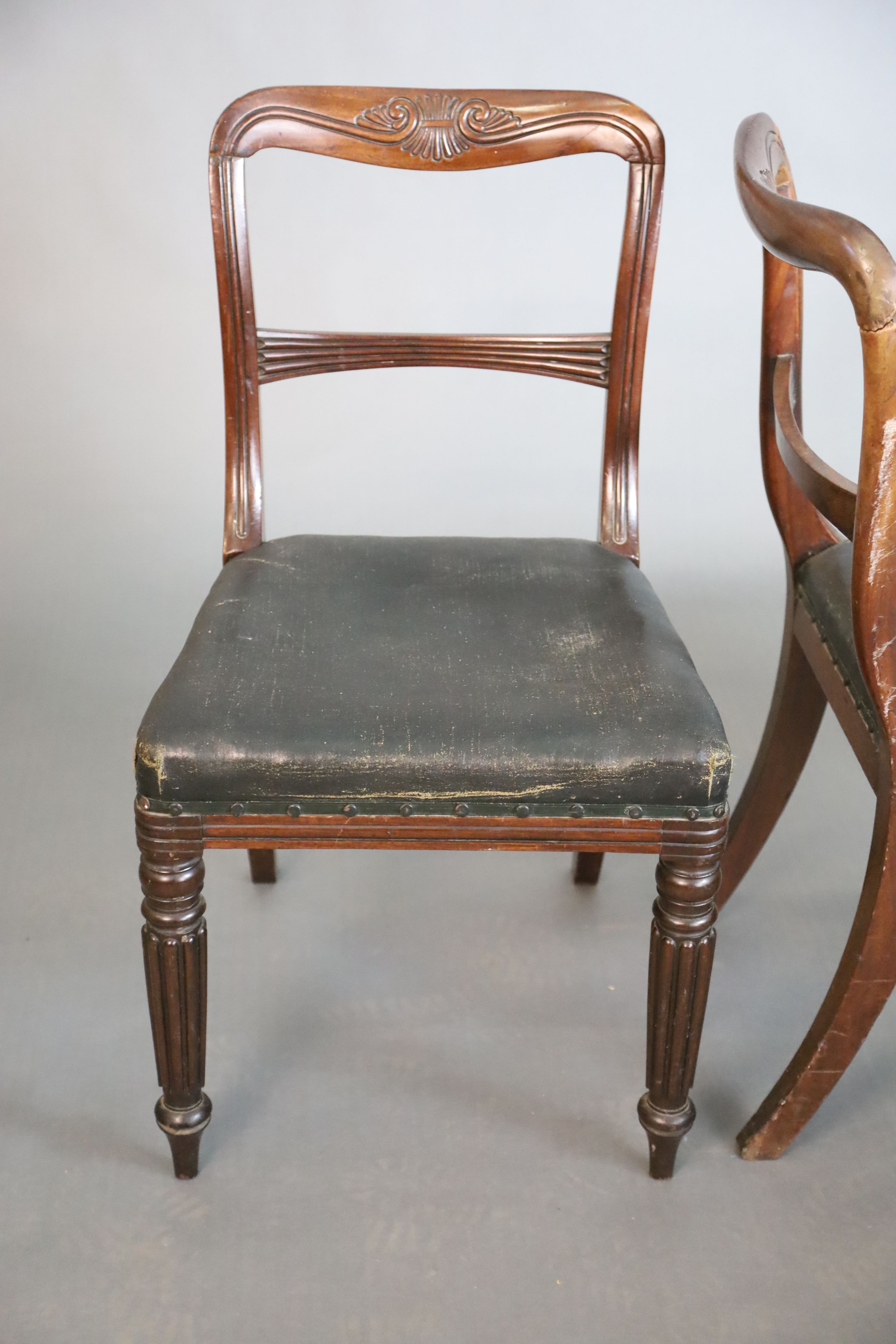 A set of four William IV mahogany buckle back dining chairs, W.48.5cm D.58.5cm H.85cm
